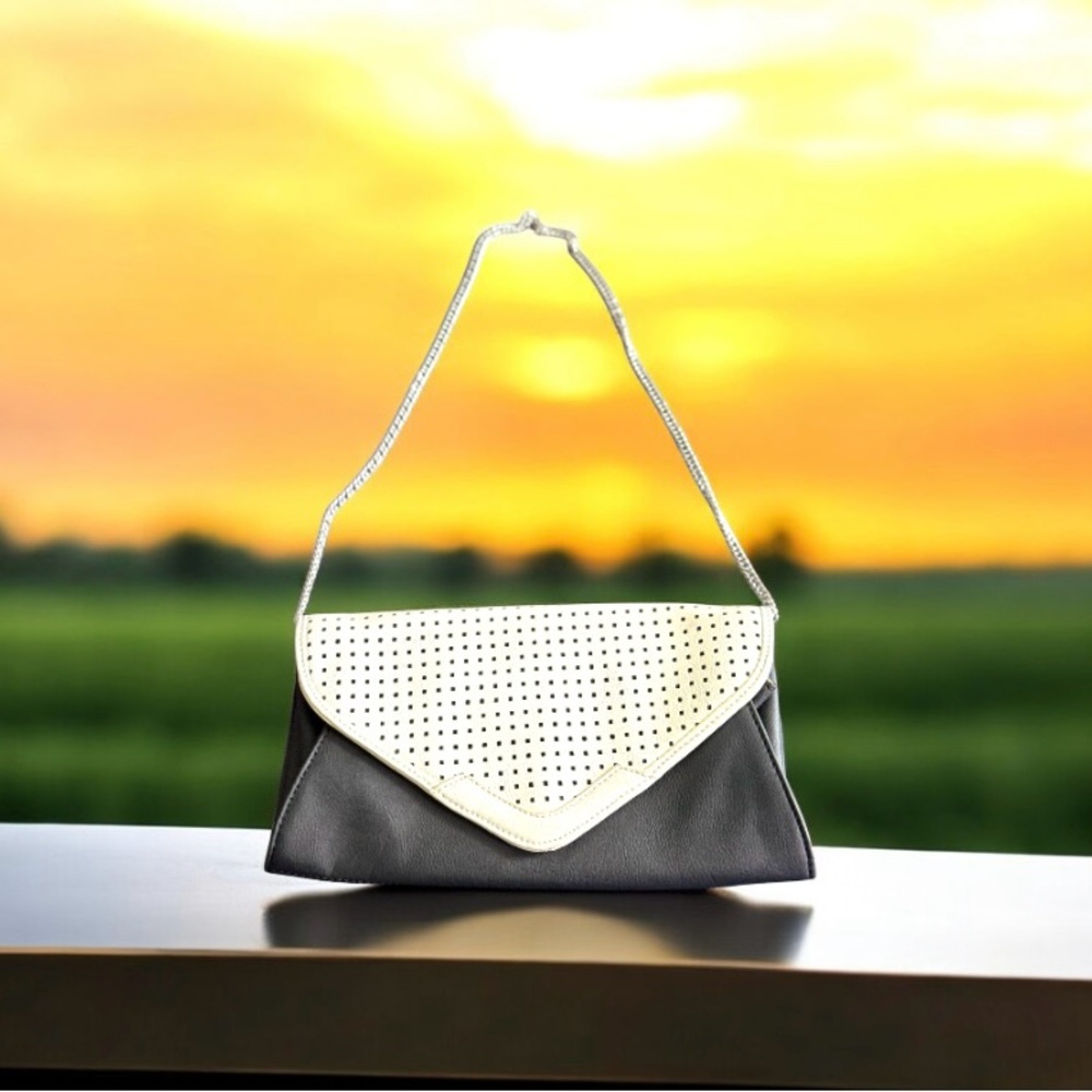 Charming Charlie Black and White Clutch with Geometric Design